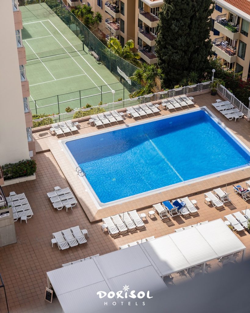 Aerial view of the pool and tennis court at Dorisol Hotels, Funchal