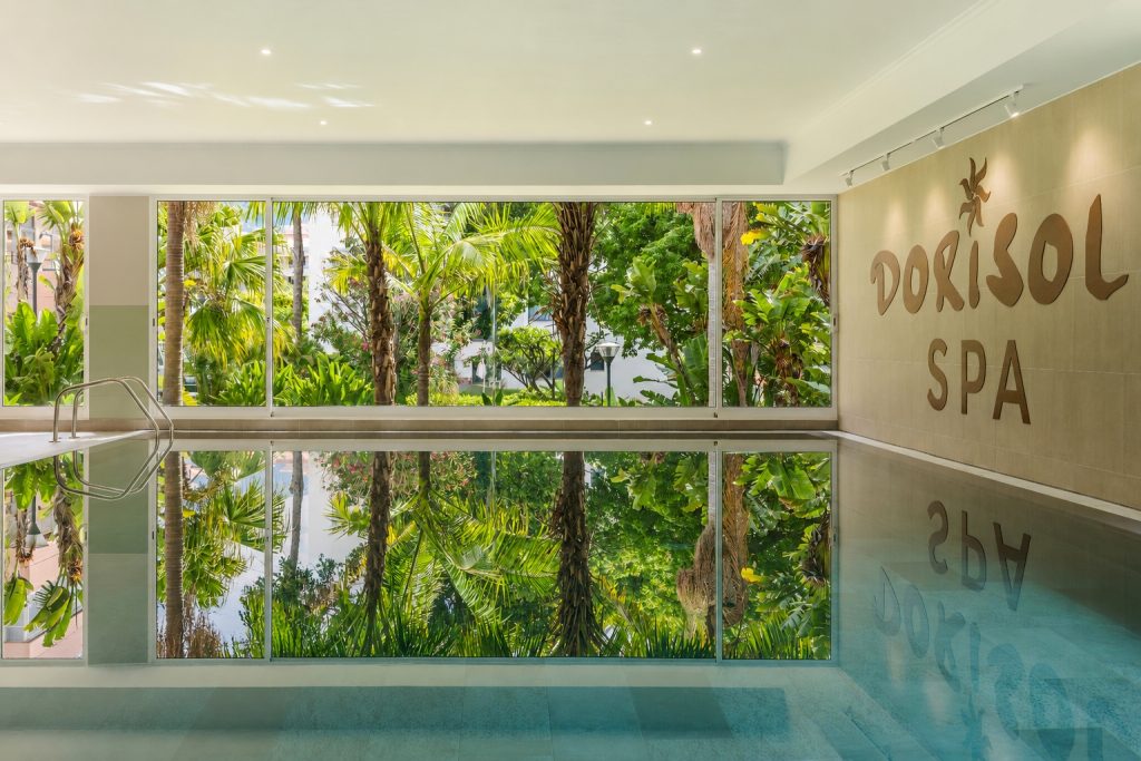 Dorisol Spa indoor pool surrounded by tropical garden