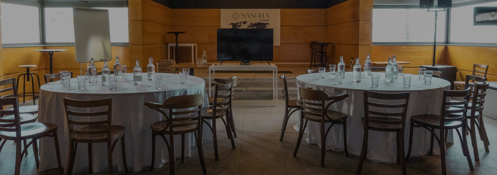 Multipurpose event room at Dorisol Hotels set up with round tables, Funchal